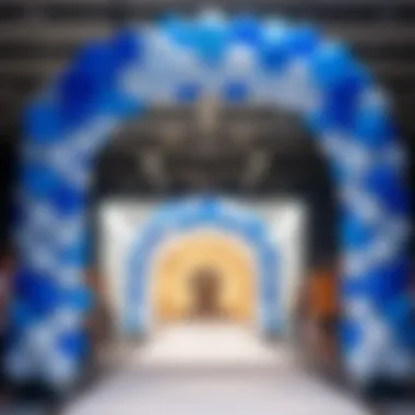 Elegant blue and white balloon arch at a fashion runway