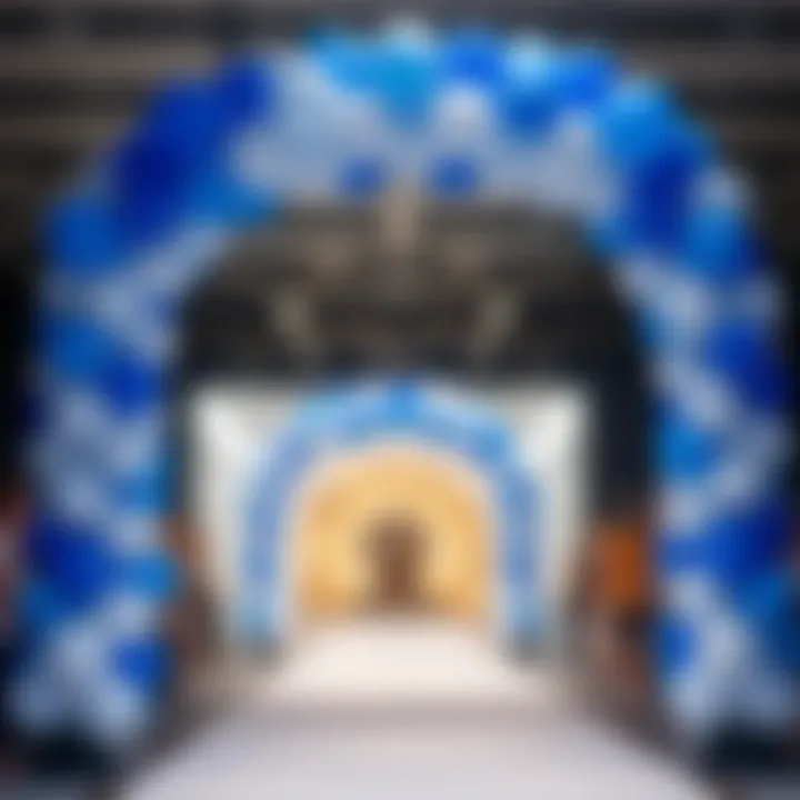 Elegant blue and white balloon arch at a fashion runway