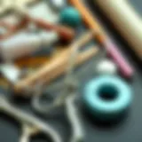 A selection of materials used for crafting a DIY eyelash curler.