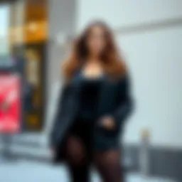 A stylish model showcasing black opaque plus size tights in a chic outfit