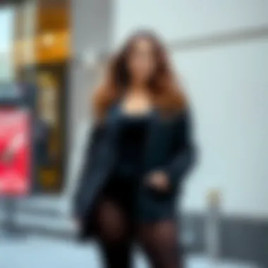 A stylish model showcasing black opaque plus size tights in a chic outfit