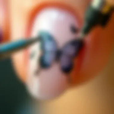 Close-up of butterfly nail stamp application