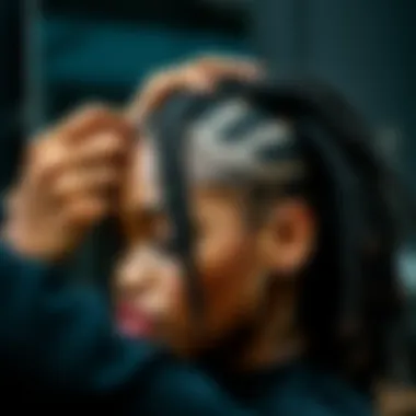 Application Technique for Nu Locs Close-up of a stylist applying 8-inch Nu Locs to a client