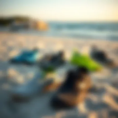 Variety of Swim Shoe Styles on the Beach Different styles of swim shoes displayed on a sandy beach