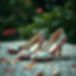 Elegant floral pattern shoes displayed on a textured surface