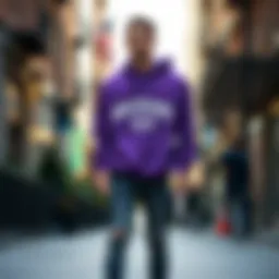 Stylish purple graphic hoodie displayed in an urban setting