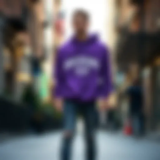 Stylish purple graphic hoodie displayed in an urban setting
