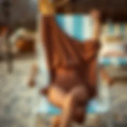 Elegant draping of a brown bathing suit cover up on a beach chair