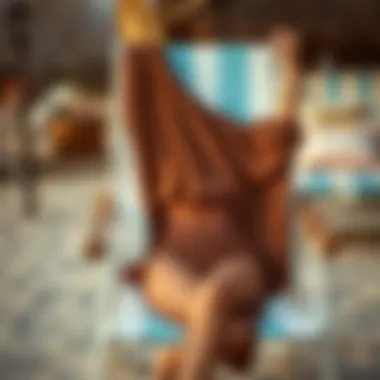 Elegant Draping on Beach Chair Elegant draping of a brown bathing suit cover up on a beach chair