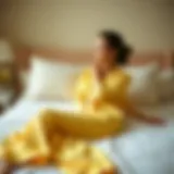 Elegance of Lemon Pajama Set A beautifully designed lemon pajama set draped elegantly on a bed.