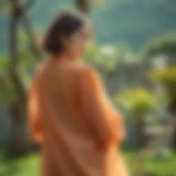 Elegantly draped long sleeve chiffon jacket showcased in a serene outdoor setting