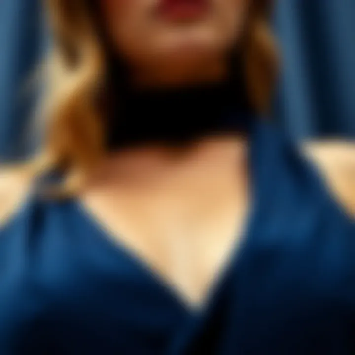 Close-up of luxurious fabric used in navy blue bodycon dresses.