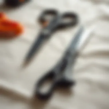 Electric vs Traditional Scissors Comparison of electric scissors and traditional scissors on a fabric