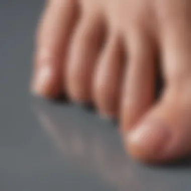 Detailed Application of Peel and Stick Polish Close-up of a toe with peel and stick toenail polish applied