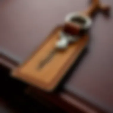 A close-up of a personalized leather bookmark with an engraved message
