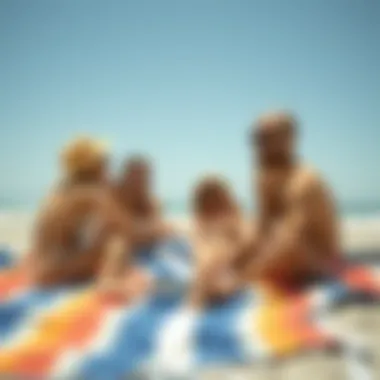 Group Enjoying a Beach Day Group enjoying a beach day with large blanket