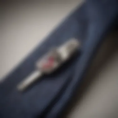 Craftsmanship Behind Bespoke Tie Clips Artisan crafting a bespoke tie clip with meticulous attention