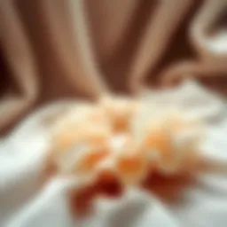 Elegant chiffon scrunchie displayed on a soft fabric